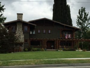 Two-story Craftsman residence with stone fireplace
